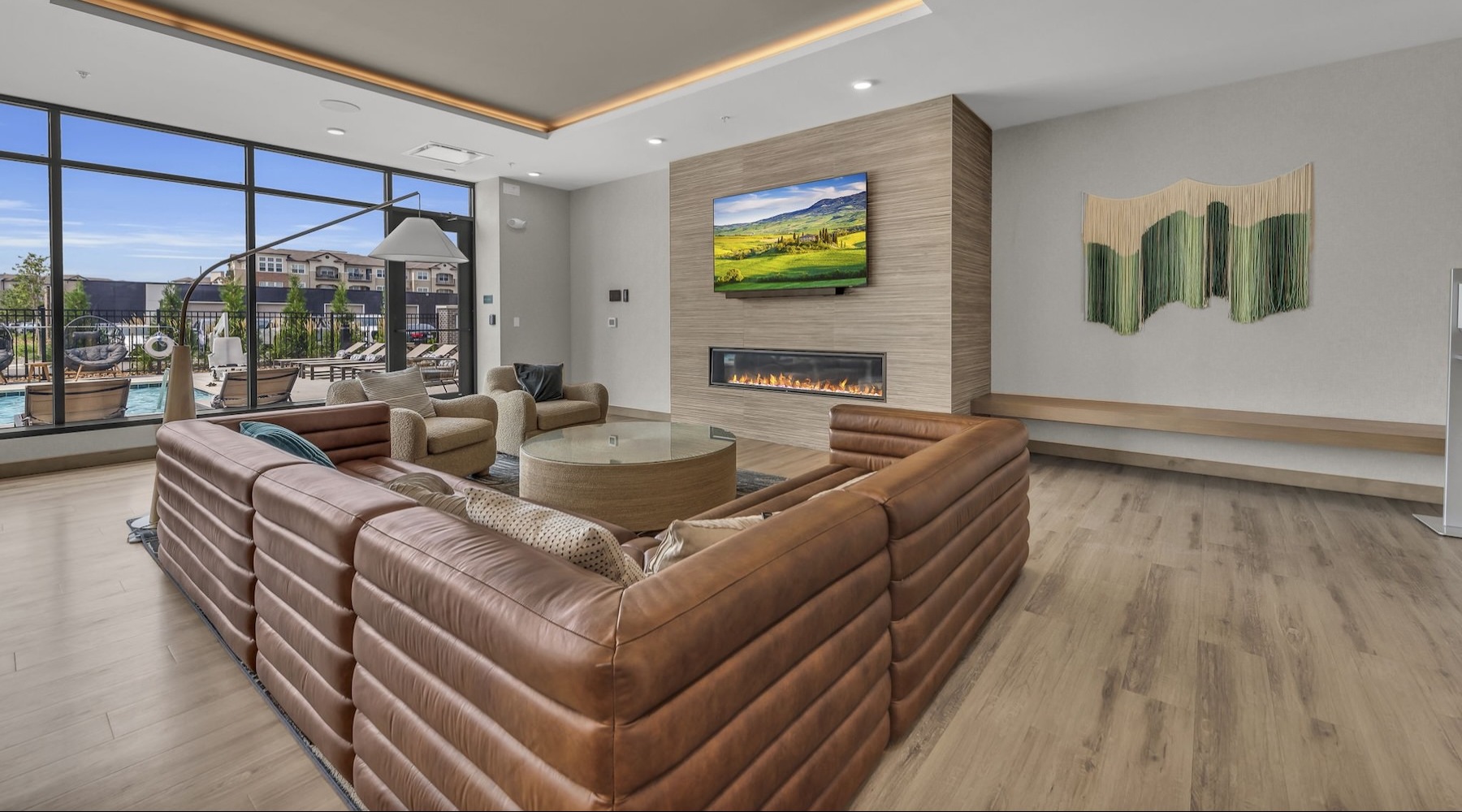 a clubroom with a couch and a tv